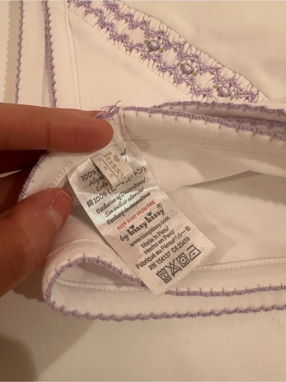 Kissy kissy White Blanket with Lavender Trim NWOT